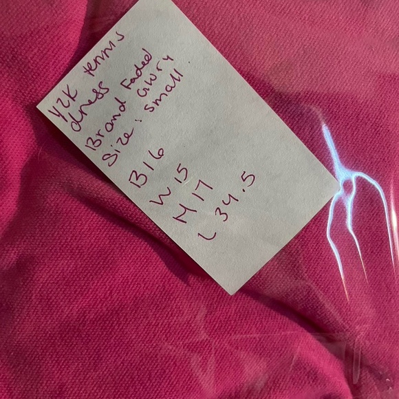 Pink polo dress with a collared neckline and short sleeves. - Picture 5 of 5